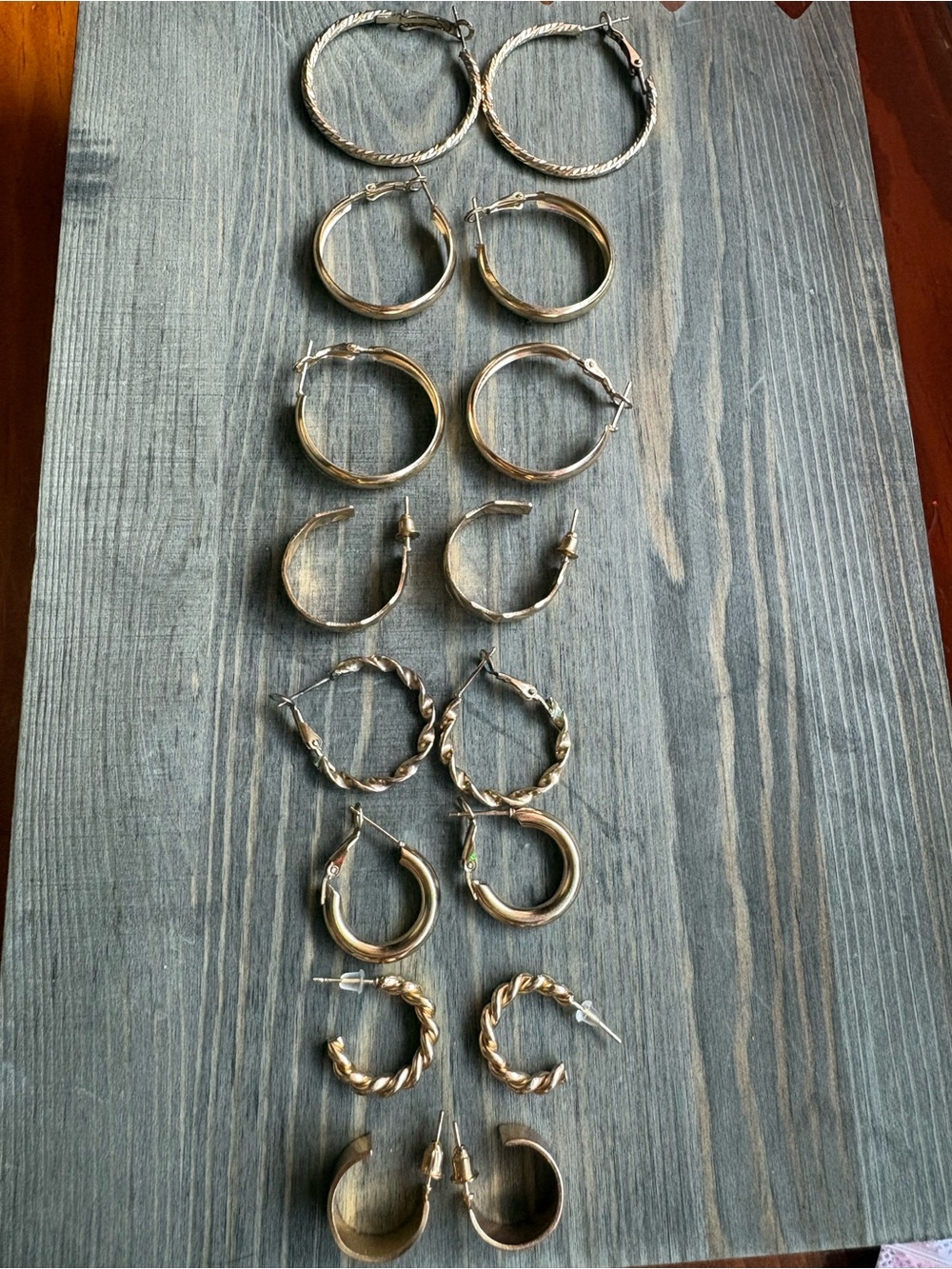 8 sets of Gold Hoop Earrings